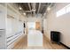 Well-organized walk-in closet with custom shelving, ample storage space, and stylish design with industrial ceiling at 5077 Thunder River Cir, Las Vegas, NV 89148