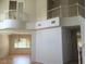 Bright entryway with a staircase, balcony, and an open view to the living area at 5147 Villa Vecchio Ct, Las Vegas, NV 89141
