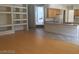 Bright kitchen featuring light wood cabinets, tile flooring, and open layout to the living area at 5147 Villa Vecchio Ct, Las Vegas, NV 89141