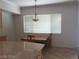Bright breakfast nook with natural light and a view of the kitchen island at 5147 Villa Vecchio Ct, Las Vegas, NV 89141