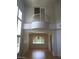 Bright living area with a balcony, natural light, and an open dining space at 5147 Villa Vecchio Ct, Las Vegas, NV 89141