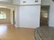 Bright living room featuring hardwood floors and large windows at 5147 Villa Vecchio Ct, Las Vegas, NV 89141