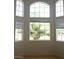 Sunlit living room with large windows offering an attractive view of the yard at 5147 Villa Vecchio Ct, Las Vegas, NV 89141
