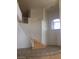 Grand foyer with a soaring ceiling and a view of the staircase at 5147 Villa Vecchio Ct, Las Vegas, NV 89141