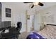 Bedroom with carpet, an office desk, and large window views at 5213 Welch Valley Ave, Las Vegas, NV 89131