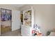 Bedroom featuring a closet, shelving, and plush toy storage at 5213 Welch Valley Ave, Las Vegas, NV 89131