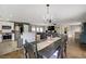 Open-concept dining area seamlessly connects to the kitchen and living room, ideal for entertaining and Gathering gatherings at 5213 Welch Valley Ave, Las Vegas, NV 89131