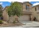 Inviting two-story home with a well-maintained yard and convenient two-car garage at 5213 Welch Valley Ave, Las Vegas, NV 89131