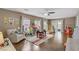 Spacious playroom features hardwood floors, natural light, and cozy furnishings at 5213 Welch Valley Ave, Las Vegas, NV 89131