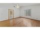 Spacious bedroom with gleaming hardwood floors and natural light at 5240 Las Cruces Dr, Las Vegas, NV 89130
