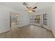 Bright breakfast nook featuring large windows, tile floors, and a ceiling fan at 5240 Las Cruces Dr, Las Vegas, NV 89130