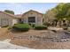 Charming single-story home featuring stone landscaping and attractive curb appeal at 5240 Las Cruces Dr, Las Vegas, NV 89130