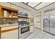 Modern kitchen with stainless steel appliances and granite countertops at 5240 Las Cruces Dr, Las Vegas, NV 89130