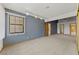 Empty spacious primary bedroom with neutral carpet and ample natural light at 5240 Las Cruces Dr, Las Vegas, NV 89130