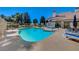 Sparkling community pool with lounge chairs, ideal for relaxation at 5508 Lochmor Ave, Las Vegas, NV 89130