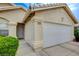 Close up of exterior showing well-manicured lawn and home address at 5508 Lochmor Ave, Las Vegas, NV 89130