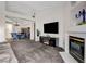 Spacious living room features a fireplace and an adjacent dining area at 5508 Lochmor Ave, Las Vegas, NV 89130