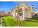Inviting backyard with lush turf, low-maintenance landscaping and mountain views at 56 Tatahatso Point St, Henderson, NV 89011