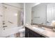Bathroom featuring a tub, shower, modern vanity and sink at 56 Tatahatso Point St, Henderson, NV 89011