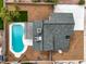 Aerial top-down view showing backyard pool, pergola, patio and roof at 5629 Caladonia Ave, Las Vegas, NV 89110