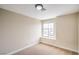 Bedroom featuring a large window, neutral walls, and carpeted floors at 5629 Caladonia Ave, Las Vegas, NV 89110