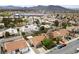 Scenic aerial view of homes with well-manicured lawns, mature trees, and desirable neighborhood appeal at 619 Ancient Mayan Dr, Henderson, NV 89015