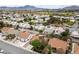 Desirable neighborhood showcasing well-kept homes with mature trees and green lawns at 619 Ancient Mayan Dr, Henderson, NV 89015