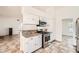 Contemporary kitchen featuring granite countertops, stainless steel appliances, and ample cabinet space at 6225 Sadler Dr, Las Vegas, NV 89130