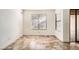 Neutral living room features tile floors, large windows, and access to the backyard at 6225 Sadler Dr, Las Vegas, NV 89130