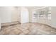 Inviting living room featuring tile flooring, neutral walls, and a bay window at 6225 Sadler Dr, Las Vegas, NV 89130