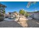 Backyard featuring a pool, spa and low maintenance gravel at 6225 Sadler Dr, Las Vegas, NV 89130