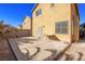 Open backyard with a desert-scape and concrete pad for patio furniture at 6365 Diego Dr, Las Vegas, NV 89156