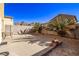Spacious backyard with desert landscaping, block wall, and mountain views at 6365 Diego Dr, Las Vegas, NV 89156