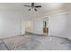 Large bedroom with double door entry and view to ensuite bathroom at 6365 Diego Dr, Las Vegas, NV 89156