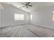 Spacious bedroom with vaulted ceilings, a ceiling fan, and several bright windows at 6365 Diego Dr, Las Vegas, NV 89156