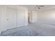Spacious bedroom featuring a ceiling fan and a large closet with sliding doors at 6365 Diego Dr, Las Vegas, NV 89156