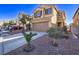 Beautiful two-story home with a two-car garage and low-maintenance desert landscaping at 6365 Diego Dr, Las Vegas, NV 89156