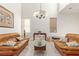 Spacious living room with high ceilings, tile floors, and large windows for ample natural light at 6365 Diego Dr, Las Vegas, NV 89156
