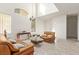 Bright living room featuring tile flooring, high ceilings, and large windows at 6365 Diego Dr, Las Vegas, NV 89156