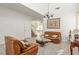 Bright living room with high ceilings, tile flooring, and an open layout for easy entertaining at 6365 Diego Dr, Las Vegas, NV 89156