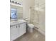 Clean bathroom featuring a shower, tiled floor, and updated sink at 6412 Dallaswood Ln, Las Vegas, NV 89156