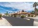 Beautiful view of this neighborhood with lush landscaping and inviting streetlights at 680 Cervantes Dr, Henderson, NV 89014