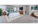 Staged bedroom with decor, including a bed with accent pillows and furniture at 7006 Sylmar Ave, Las Vegas, NV 89113