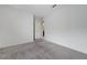 Bright carpeted bedroom features neutral walls and closet at 7006 Sylmar Ave, Las Vegas, NV 89113