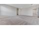Bonus room features neutral carpeting and provides access to a closet at 7006 Sylmar Ave, Las Vegas, NV 89113