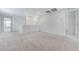 Bonus room features neutral carpeting and provides access to additional rooms at 7006 Sylmar Ave, Las Vegas, NV 89113