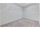 Walk-in closet featuring neutral carpeting and wire shelf storage at 7006 Sylmar Ave, Las Vegas, NV 89113