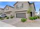 Lovely two-story home with a two-car garage, surrounded by neatly arranged landscaping at 7006 Sylmar Ave, Las Vegas, NV 89113
