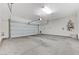 Spacious garage with a rolling door and concrete floor at 7006 Sylmar Ave, Las Vegas, NV 89113