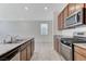 Kitchen with stainless steel appliances, granite countertops and ample cabinet space at 7006 Sylmar Ave, Las Vegas, NV 89113